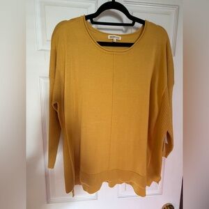 Saffron lightweight sweater with unique ribbing/seaming.